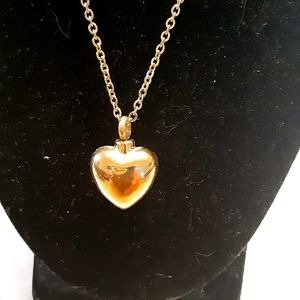 Gold over titanium heart urn necklace